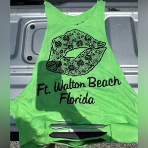 Bright green tank top, cut out sleeves